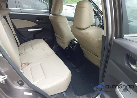 2015 Honda Cr-V Touring z USA, uszkodzony, nr VIN 5J6RM4H9XFL061928